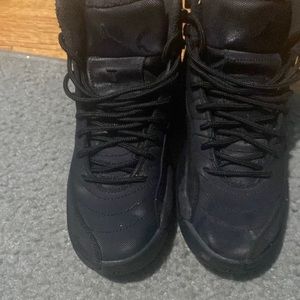 All black Jordan 12s size 6 Gradeschool
